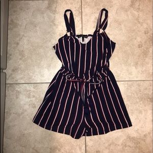 A navy blue striped romper(stripes red and white)